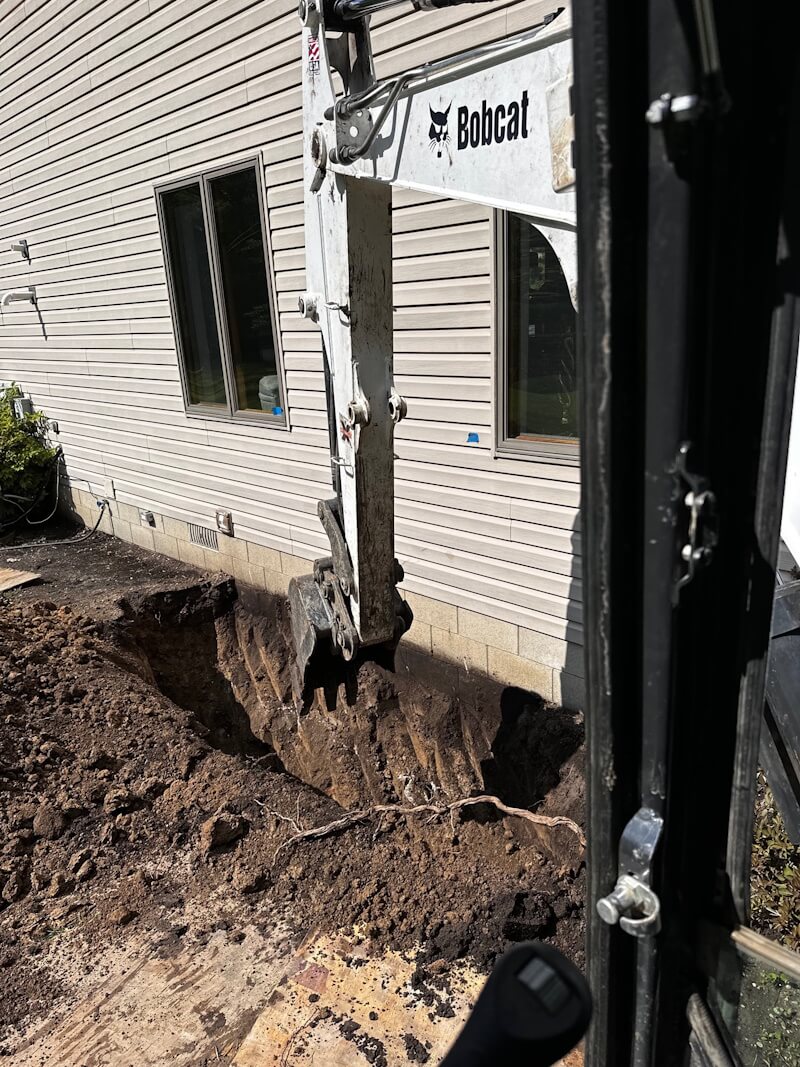 Rockwood Michigan Foundation Repair - heavy equipment to dig foundation perimeter